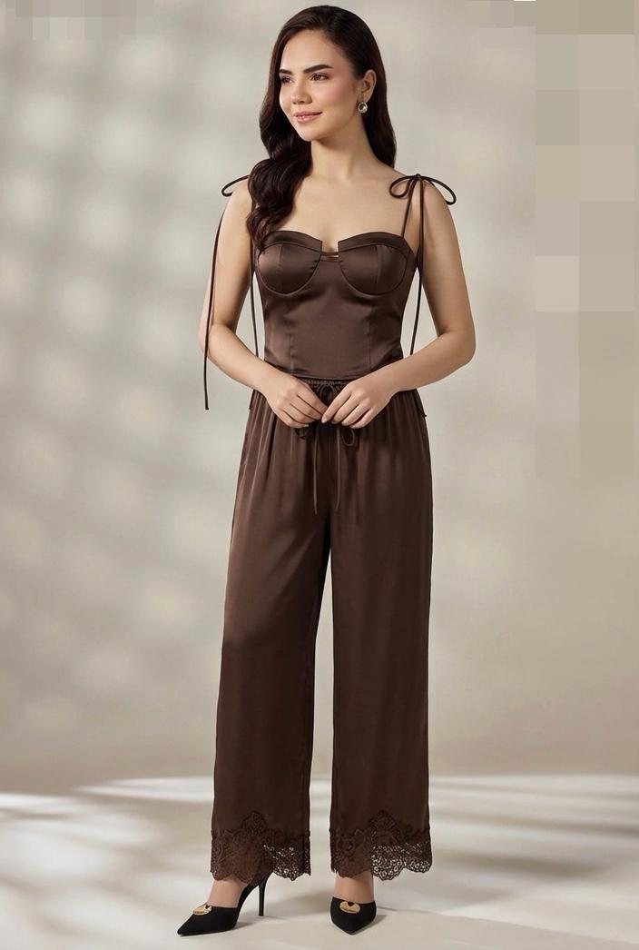 Woman wearing FELENI Chocolate Satin Corset and Wide-Leg Lace Trouser Set for a date night look